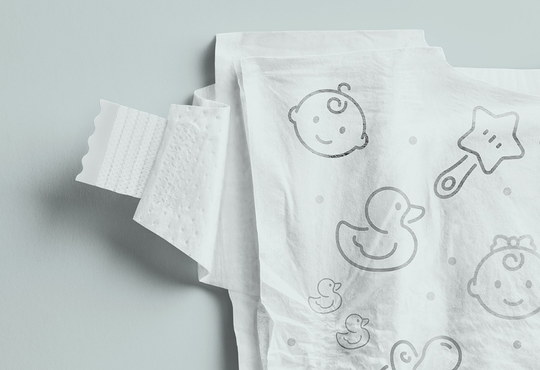 Open baby diaper showing hook closure fastening system for secure fit